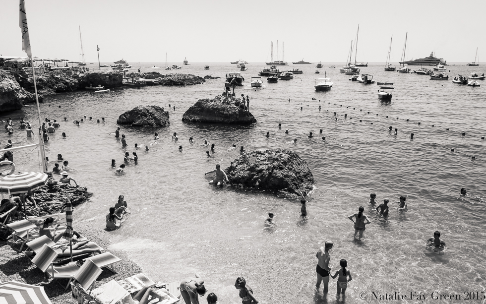 Swimmers and boats at Capri Island in Itlay