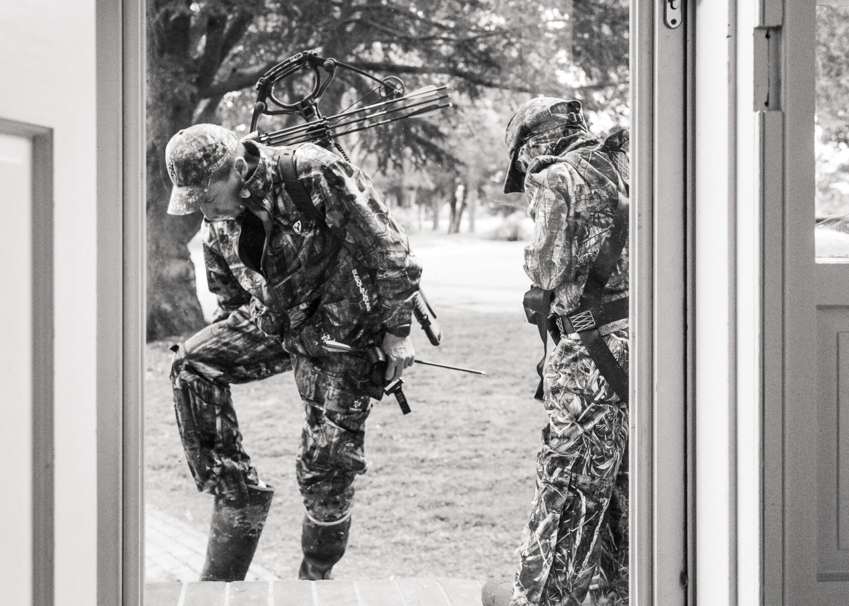 man and child going hunting