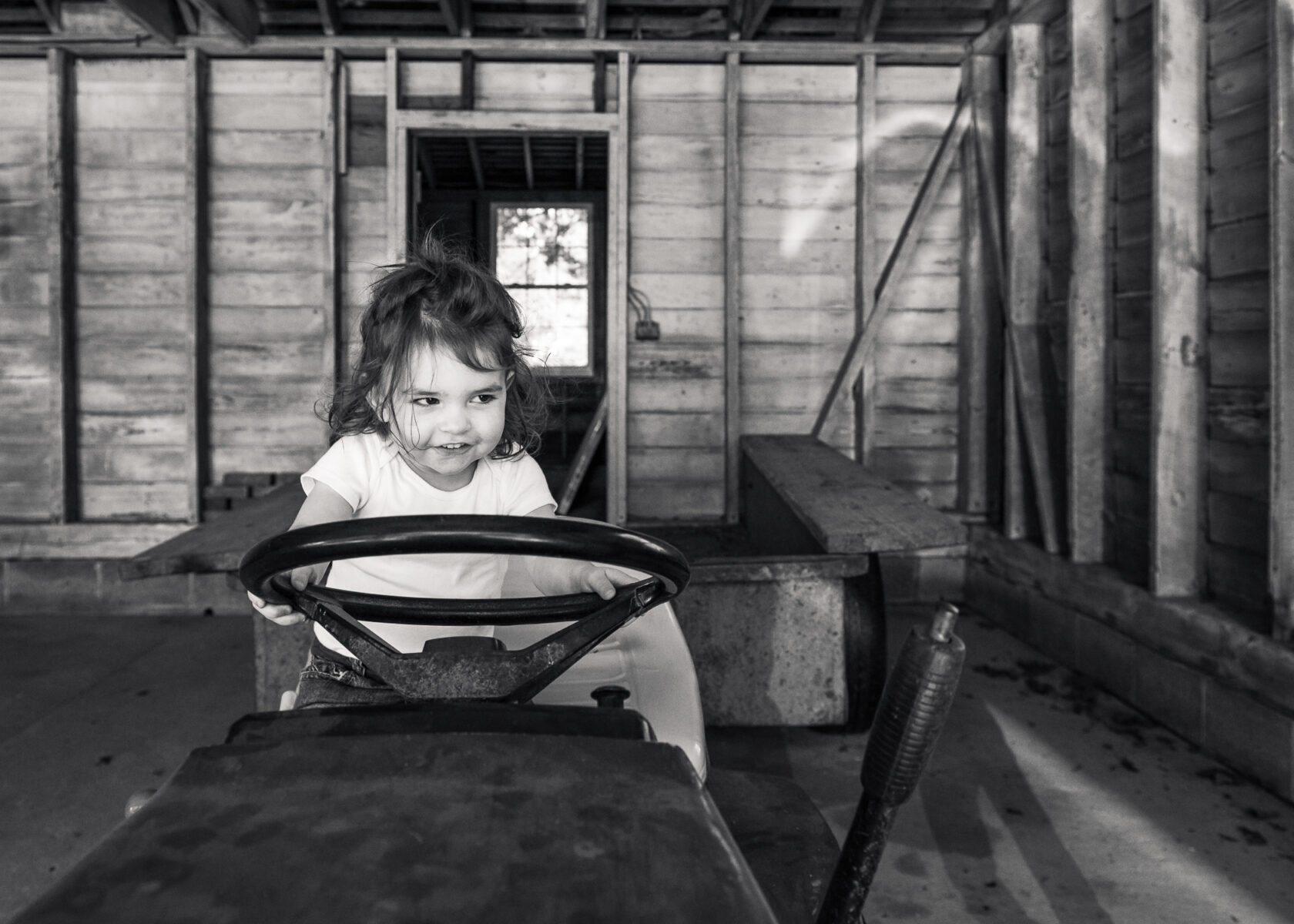 girl driving tractor
