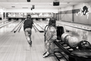 Brother and sister bowling