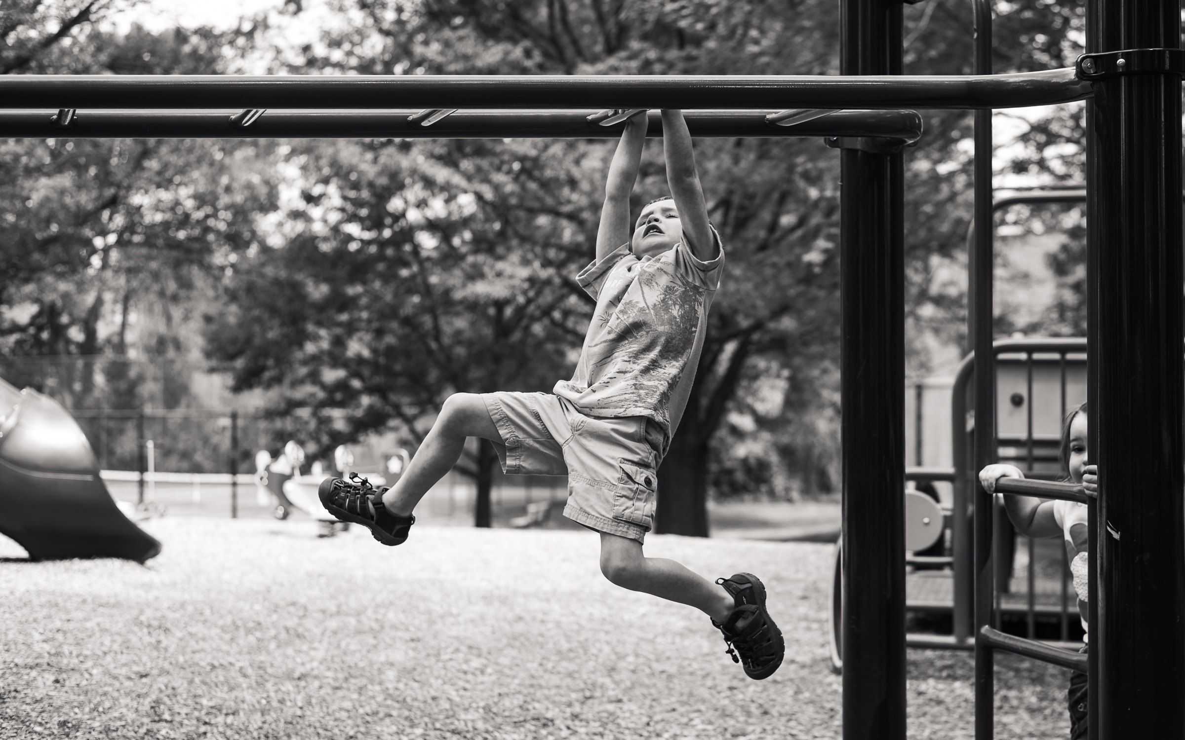 First-Time-Across-The-Monkey-Bars boy crossing the monkey bars for the first time