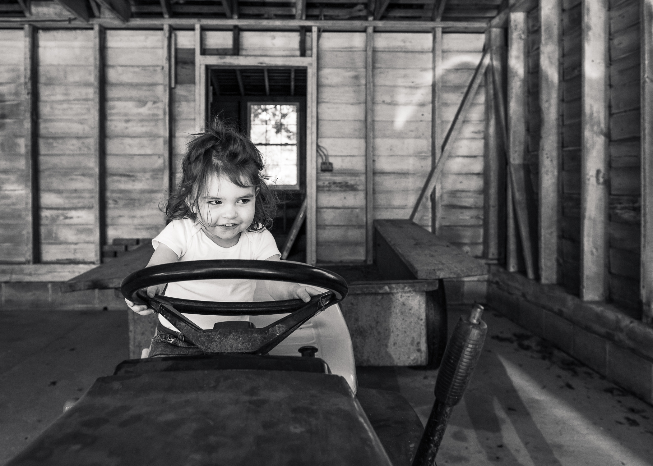 RiversEdge-2 girl driving tractor