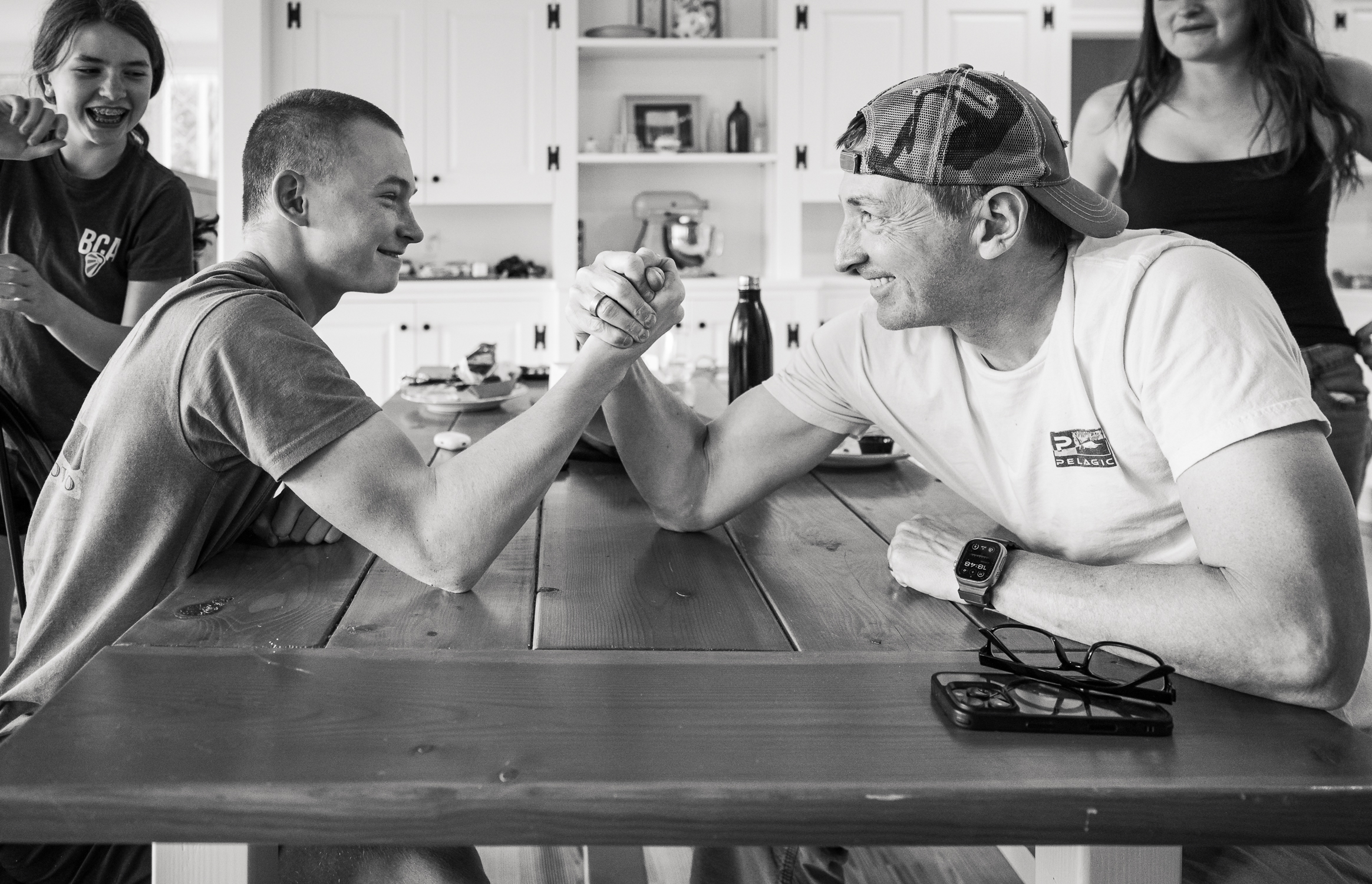 growinghumans-5 boy and dad arm wrestling